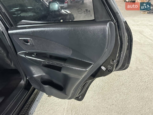 Чорний Хендай Туксон, об'ємом двигуна 2 л та пробігом 252 тис. км за 3000 $, фото 36 на Automoto.ua
