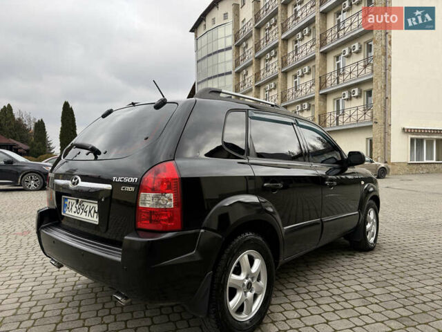 Черный Хендай Туксон, объемом двигателя 1.98 л и пробегом 250 тыс. км за 7150 $, фото 5 на Automoto.ua