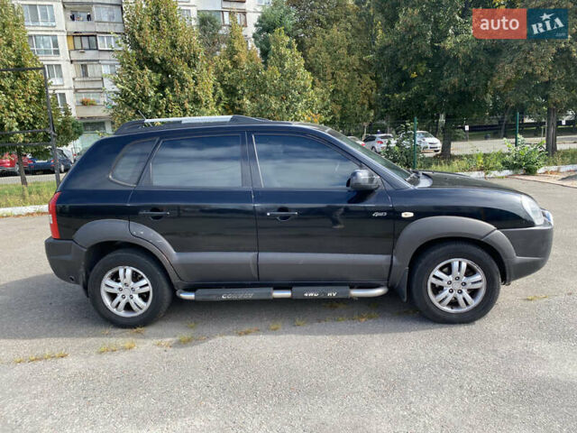 Черный Хендай Туксон, объемом двигателя 2 л и пробегом 317 тыс. км за 6999 $, фото 3 на Automoto.ua