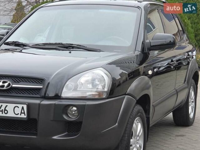 Чорний Хендай Туксон, об'ємом двигуна 1.98 л та пробігом 123 тис. км за 7950 $, фото 22 на Automoto.ua