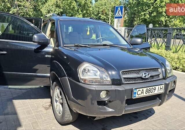 Чорний Хендай Туксон, об'ємом двигуна 2.7 л та пробігом 265 тис. км за 8300 $, фото 7 на Automoto.ua