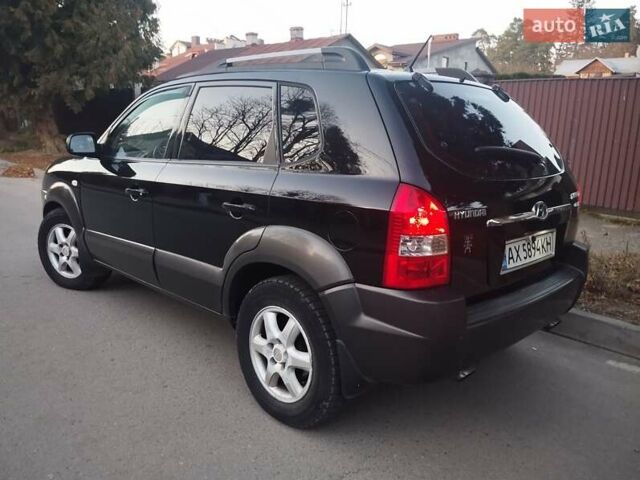 Чорний Хендай Туксон, об'ємом двигуна 1.99 л та пробігом 239 тис. км за 6990 $, фото 12 на Automoto.ua