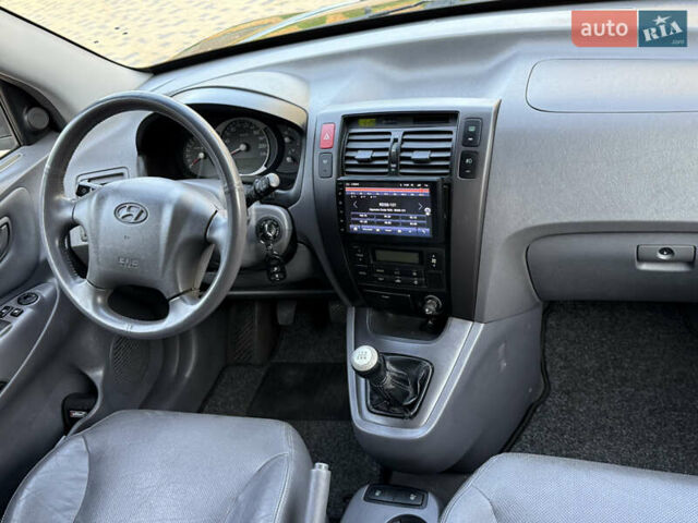 Чорний Хендай Туксон, об'ємом двигуна 1.98 л та пробігом 212 тис. км за 8200 $, фото 60 на Automoto.ua