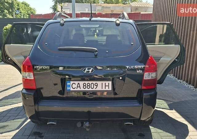 Чорний Хендай Туксон, об'ємом двигуна 2.7 л та пробігом 265 тис. км за 8300 $, фото 5 на Automoto.ua