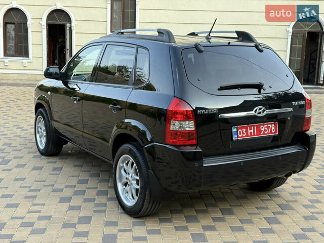 Чорний Хендай Туксон, об'ємом двигуна 1.98 л та пробігом 212 тис. км за 8200 $, фото 14 на Automoto.ua