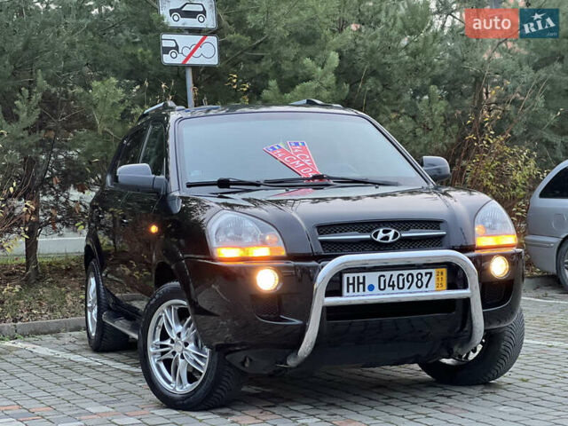 Чорний Хендай Туксон, об'ємом двигуна 1.98 л та пробігом 170 тис. км за 6999 $, фото 1 на Automoto.ua
