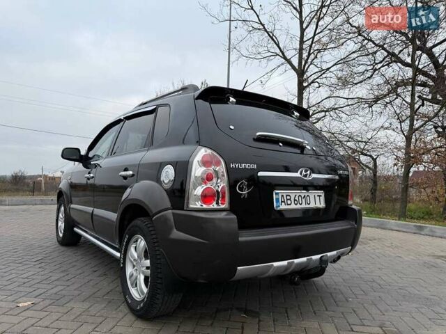 Чорний Хендай Туксон, об'ємом двигуна 2 л та пробігом 124 тис. км за 7950 $, фото 18 на Automoto.ua