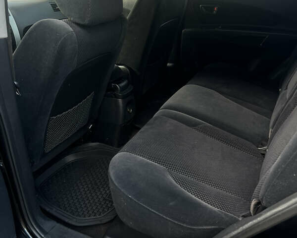 Черный Хендай Туксон, объемом двигателя 2 л и пробегом 355 тыс. км за 7000 $, фото 11 на Automoto.ua