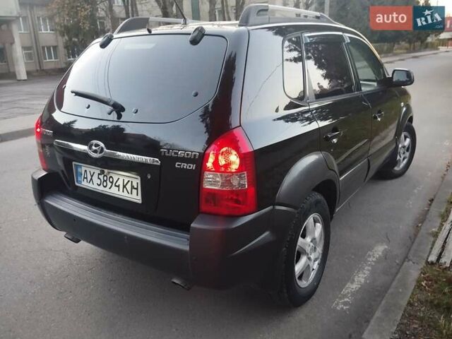 Чорний Хендай Туксон, об'ємом двигуна 1.99 л та пробігом 239 тис. км за 6990 $, фото 9 на Automoto.ua