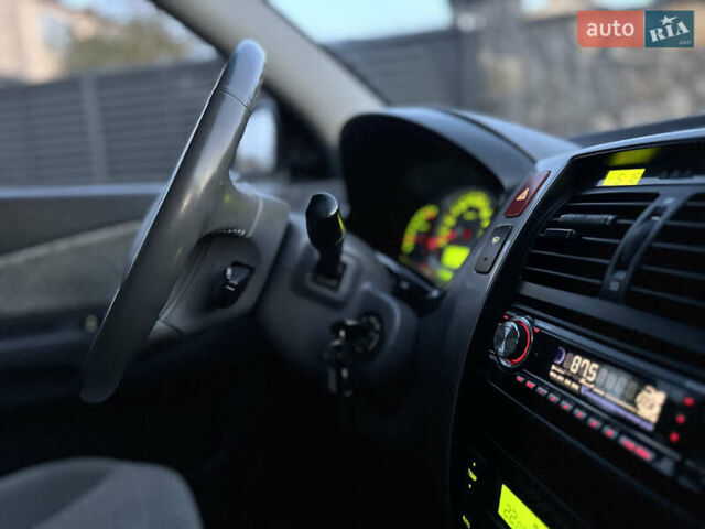 Хендай Туксон 2006 в Хмельницком на Automoto.ua Черный Хендай Туксон, объемом двигателя 1.98 л и пробегом 197 тыс. км за 7790 $, фото 11 на Automoto.ua