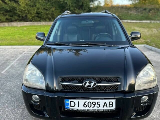 Чорний Хендай Туксон, об'ємом двигуна 2 л та пробігом 235 тис. км за 6700 $, фото 4 на Automoto.ua