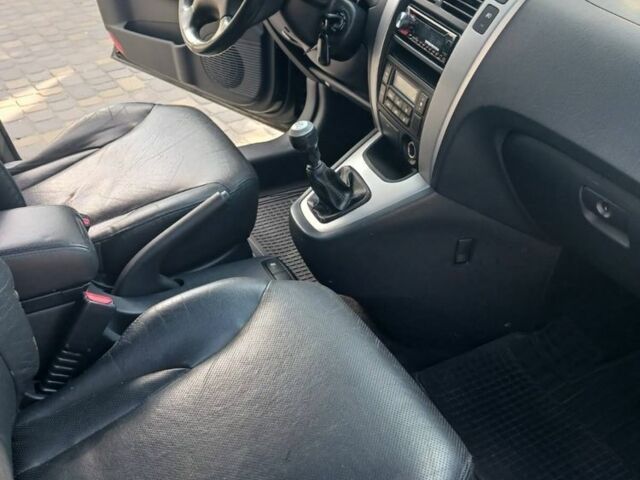 Черный Хендай Туксон, объемом двигателя 2 л и пробегом 266 тыс. км за 7700 $, фото 5 на Automoto.ua