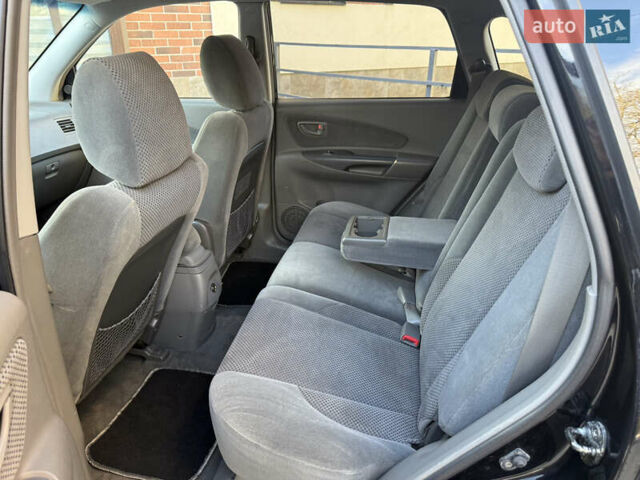 Черный Хендай Туксон, объемом двигателя 2 л и пробегом 249 тыс. км за 7450 $, фото 25 на Automoto.ua