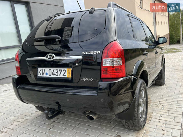 Чорний Хендай Туксон, об'ємом двигуна 2 л та пробігом 144 тис. км за 6599 $, фото 16 на Automoto.ua