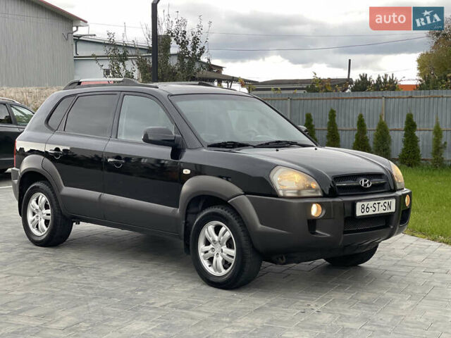 Черный Хендай Туксон, объемом двигателя 2 л и пробегом 216 тыс. км за 7700 $, фото 9 на Automoto.ua
