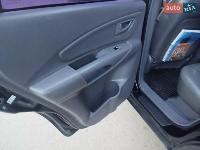 Чорний Хендай Туксон, об'ємом двигуна 1.99 л та пробігом 239 тис. км за 6990 $, фото 25 на Automoto.ua