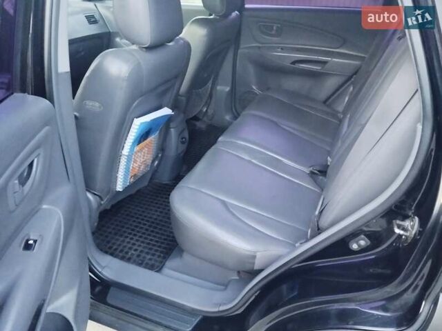 Чорний Хендай Туксон, об'ємом двигуна 1.99 л та пробігом 239 тис. км за 6990 $, фото 24 на Automoto.ua