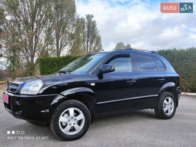 Черный Хендай Туксон, объемом двигателя 2 л и пробегом 237 тыс. км за 7999 $, фото 10 на Automoto.ua