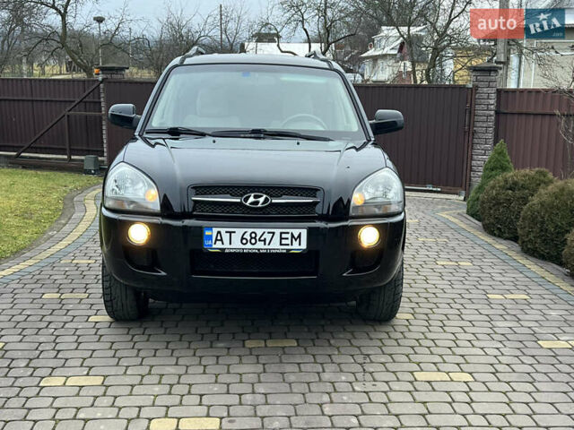 Чорний Хендай Туксон, об'ємом двигуна 1.98 л та пробігом 185 тис. км за 6850 $, фото 7 на Automoto.ua