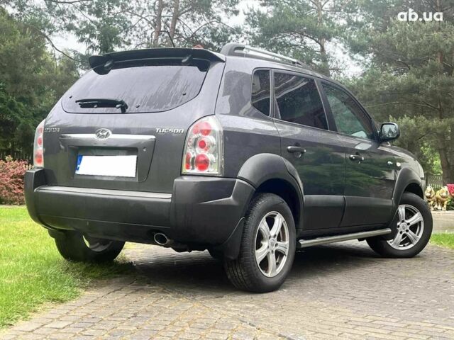Черный Хендай Туксон, объемом двигателя 2.2 л и пробегом 230 тыс. км за 2300 $, фото 5 на Automoto.ua