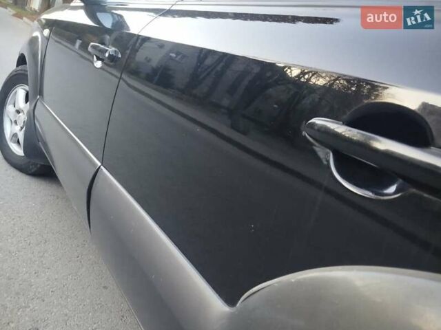 Чорний Хендай Туксон, об'ємом двигуна 1.99 л та пробігом 239 тис. км за 6990 $, фото 7 на Automoto.ua