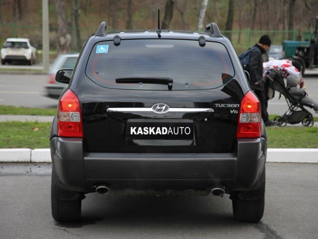 Черный Хендай Туксон, объемом двигателя 2.7 л и пробегом 217 тыс. км за 8600 $, фото 4 на Automoto.ua