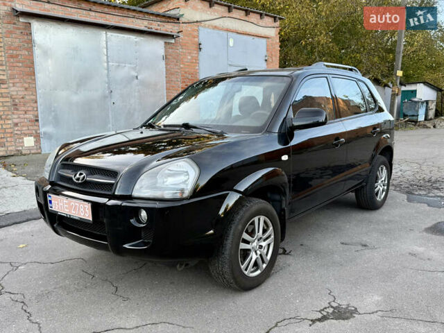 Черный Хендай Туксон, объемом двигателя 2 л и пробегом 189 тыс. км за 7150 $, фото 4 на Automoto.ua