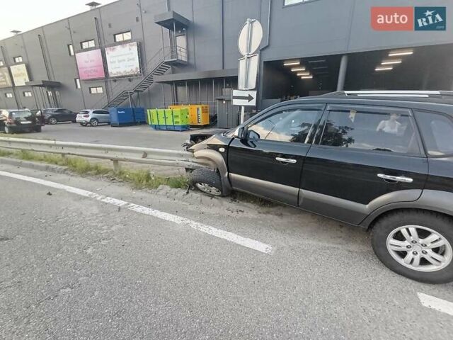 Черный Хендай Туксон, объемом двигателя 2.7 л и пробегом 275 тыс. км за 5500 $, фото 3 на Automoto.ua