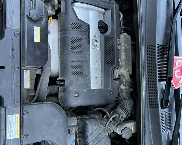 Чорний Хендай Туксон, об'ємом двигуна 1.98 л та пробігом 170 тис. км за 6999 $, фото 55 на Automoto.ua