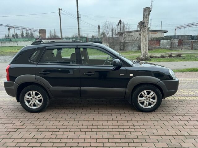 Черный Хендай Туксон, объемом двигателя 2 л и пробегом 220 тыс. км за 7200 $, фото 15 на Automoto.ua