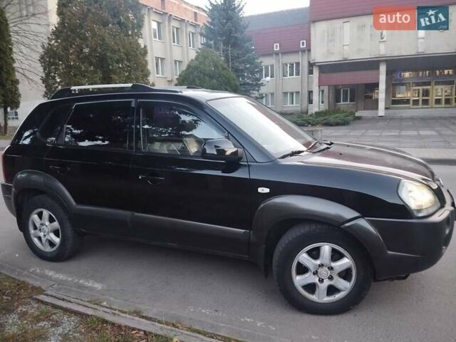 Чорний Хендай Туксон, об'ємом двигуна 1.99 л та пробігом 239 тис. км за 6990 $, фото 5 на Automoto.ua