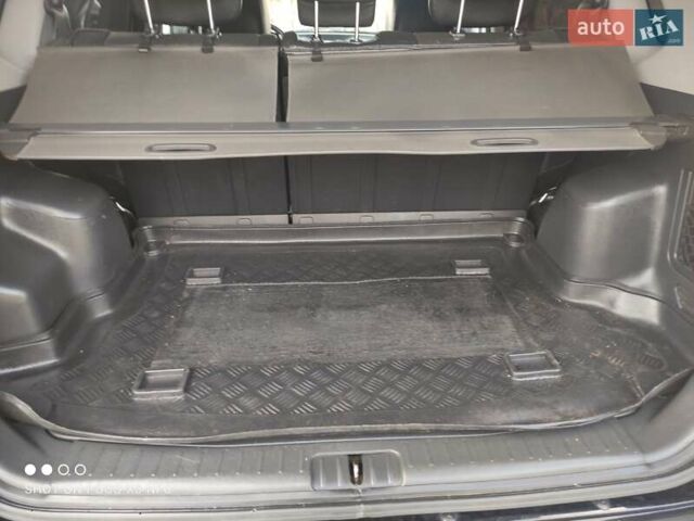 Черный Хендай Туксон, объемом двигателя 2 л и пробегом 237 тыс. км за 7999 $, фото 3 на Automoto.ua