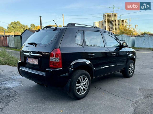 Черный Хендай Туксон, объемом двигателя 2 л и пробегом 189 тыс. км за 7150 $, фото 8 на Automoto.ua