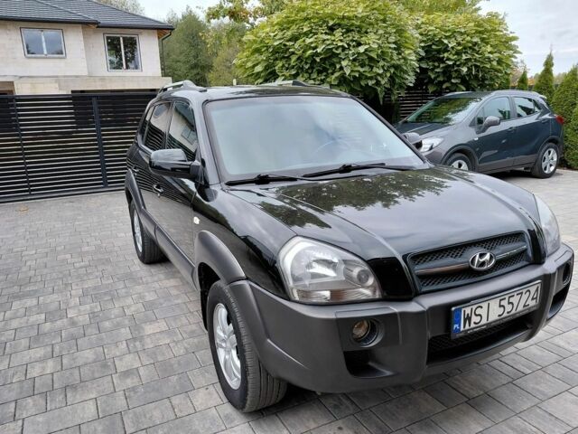 Черный Хендай Туксон, объемом двигателя 2 л и пробегом 233 тыс. км за 7000 $, фото 1 на Automoto.ua