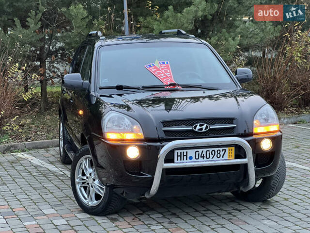 Чорний Хендай Туксон, об'ємом двигуна 1.98 л та пробігом 170 тис. км за 6999 $, фото 4 на Automoto.ua