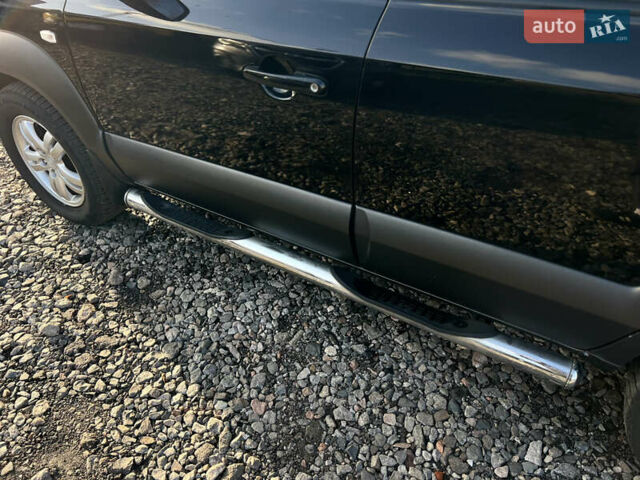 Черный Хендай Туксон, объемом двигателя 1.98 л и пробегом 191 тыс. км за 8300 $, фото 17 на Automoto.ua