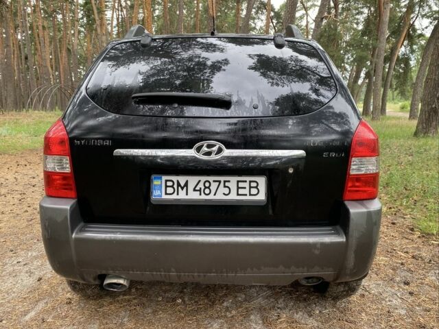 Черный Хендай Туксон, объемом двигателя 2 л и пробегом 227 тыс. км за 6950 $, фото 14 на Automoto.ua
