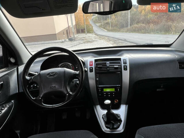 Хендай Туксон 2006 у Тернополі на Automoto.ua Чорний Хендай Туксон, об'ємом двигуна 2 л та пробігом 240 тис. км за 6699 $, фото 44 на Automoto.ua