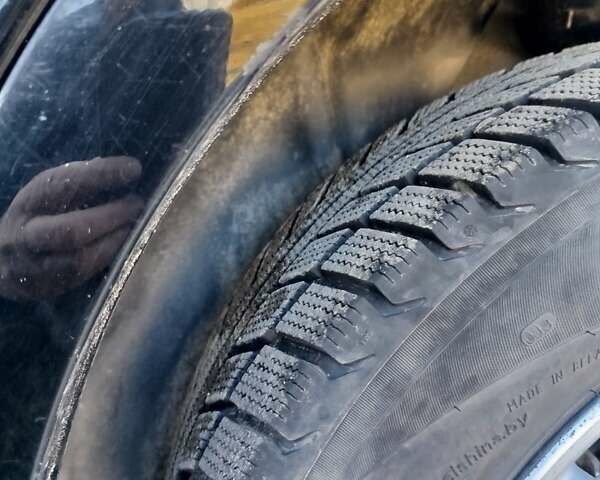 Черный Хендай Туксон, объемом двигателя 1.98 л и пробегом 205 тыс. км за 7200 $, фото 10 на Automoto.ua
