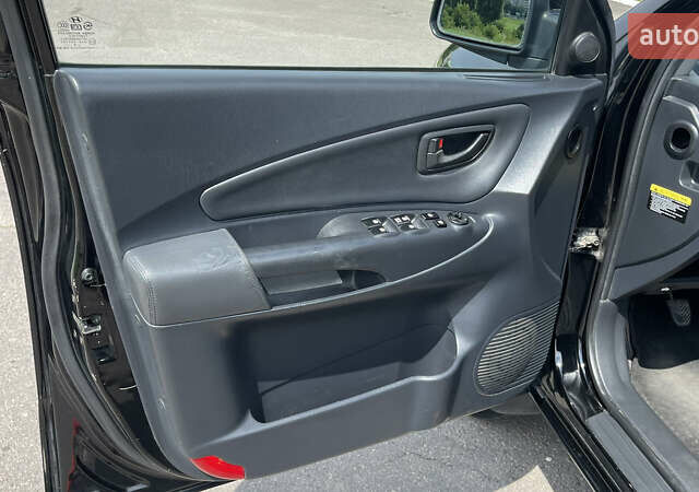 Черный Хендай Туксон, объемом двигателя 2 л и пробегом 236 тыс. км за 6950 $, фото 16 на Automoto.ua