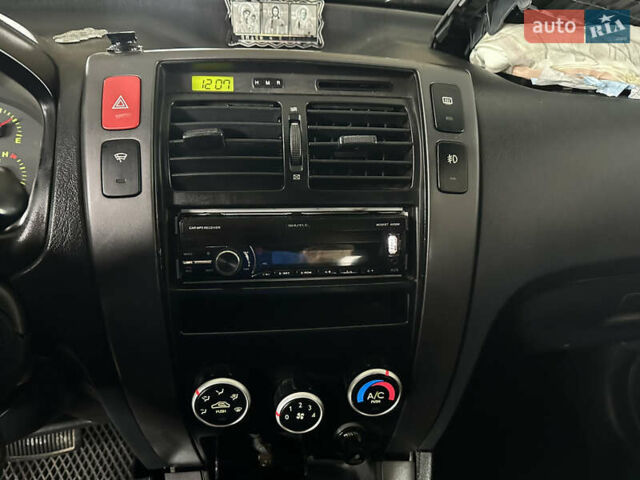 Чорний Хендай Туксон, об'ємом двигуна 2 л та пробігом 252 тис. км за 3000 $, фото 32 на Automoto.ua