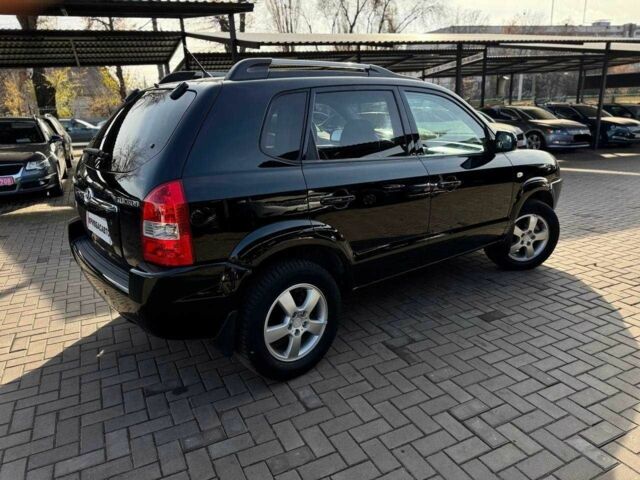 Чорний Хендай Туксон, об'ємом двигуна 2 л та пробігом 207 тис. км за 8000 $, фото 8 на Automoto.ua