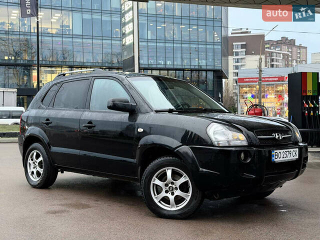 Чорний Хендай Туксон, об'ємом двигуна 1.99 л та пробігом 310 тис. км за 6399 $, фото 10 на Automoto.ua