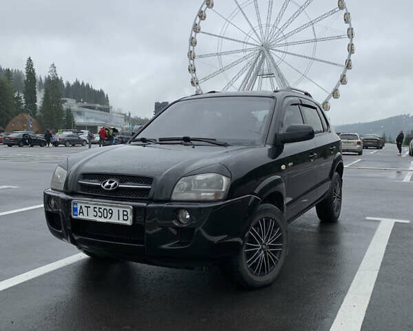 Черный Хендай Туксон, объемом двигателя 2 л и пробегом 277 тыс. км за 7900 $, фото 1 на Automoto.ua