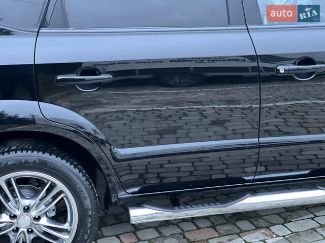 Чорний Хендай Туксон, об'ємом двигуна 1.98 л та пробігом 170 тис. км за 6999 $, фото 17 на Automoto.ua