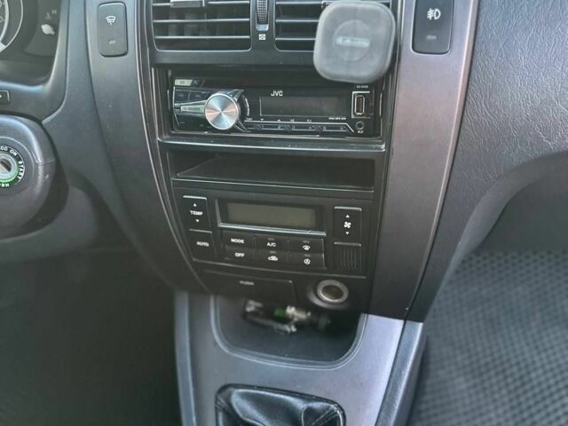 Чорний Хендай Туксон, об'ємом двигуна 2 л та пробігом 235 тис. км за 6700 $, фото 14 на Automoto.ua