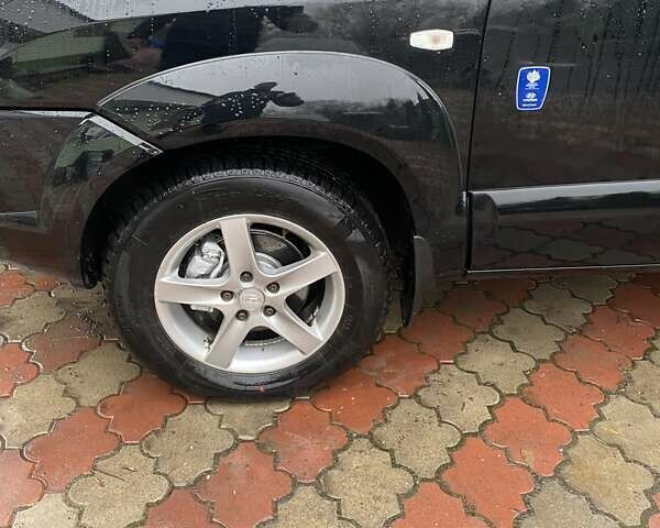 Чорний Хендай Туксон, об'ємом двигуна 1.98 л та пробігом 202 тис. км за 7350 $, фото 5 на Automoto.ua