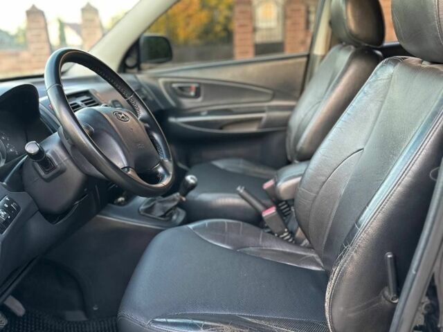 Чорний Хендай Туксон, об'ємом двигуна 2 л та пробігом 235 тис. км за 6700 $, фото 5 на Automoto.ua