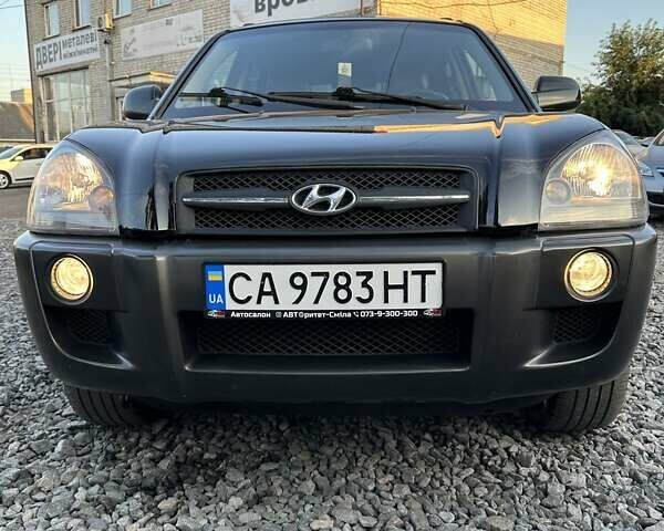 Черный Хендай Туксон, объемом двигателя 2 л и пробегом 225 тыс. км за 7350 $, фото 8 на Automoto.ua