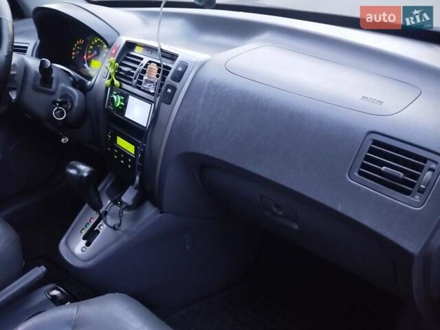 Чорний Хендай Туксон, об'ємом двигуна 1.99 л та пробігом 239 тис. км за 6990 $, фото 19 на Automoto.ua